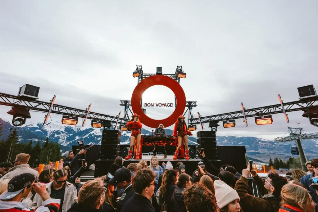 March Glow 3 – stage and lighting technology against an impressive mountain backdrop.
